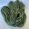 il_fullxfull.4642381158_nk81.jpg Hand spun Shetland yarn combined with merino and sari silk in forest greens.