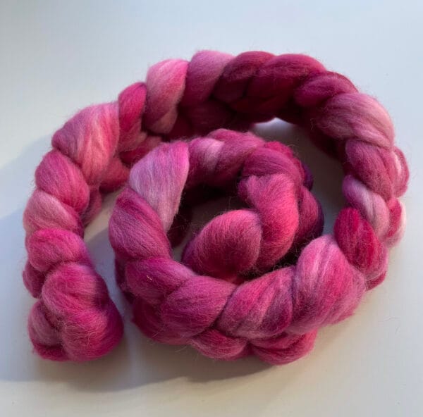 Hand-dyed German Merino Roving 25 Micron in Raspberry Pink.