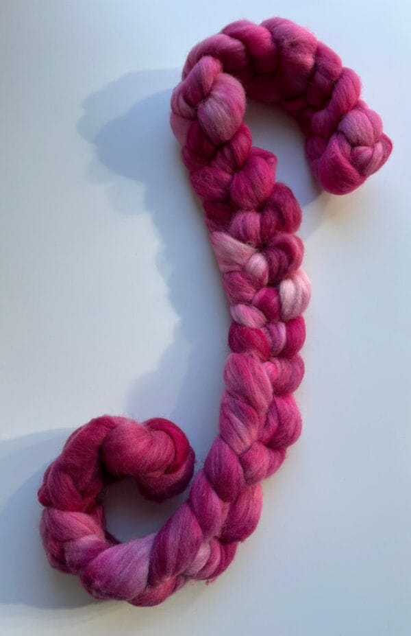 Hand-dyed German Merino Roving 25 Micron in Raspberry Pink.