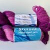 Hand dyed superwash superfine Merino, Alpaca and mulberry silk yarn. Pooling pink and deep purple.