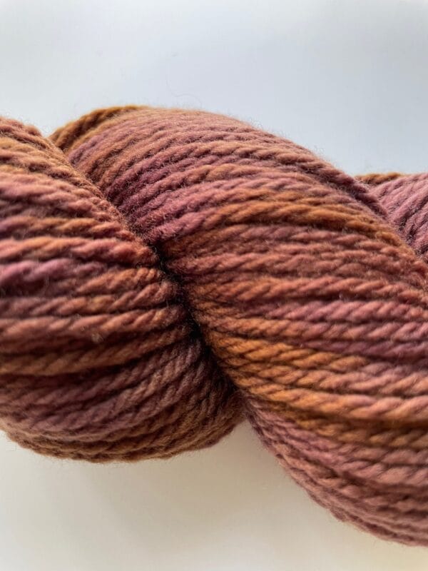 il_fullxfull.5723292073_fp1t.jpg Hand dyed superwash Merino Aran weight yarn. Semi solid Maroon.