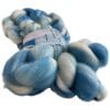 Hand dyed superwash extra fine Merino top. ‘Schapenwolkjes’. Soft roving with sky blue stripes on a white base.