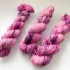 Hand dyed superwash Merino and bio nylon sock  weight yarn. ‘Flamengo’.
