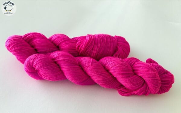 Semi solid superwash Merino yarn. ‘Neon pink’