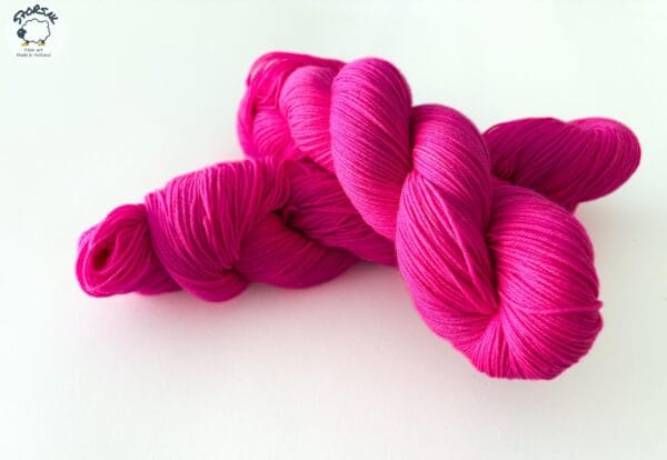 Semi solid superwash Merino yarn. ‘Neon pink’