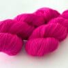 Semi solid superwash Merino yarn. ‘Neon pink’