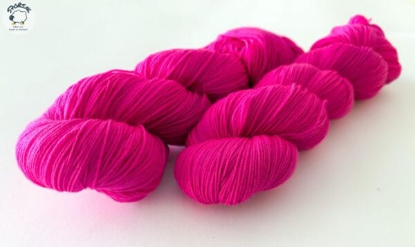 Semi solid superwash Merino yarn. ‘Neon pink’