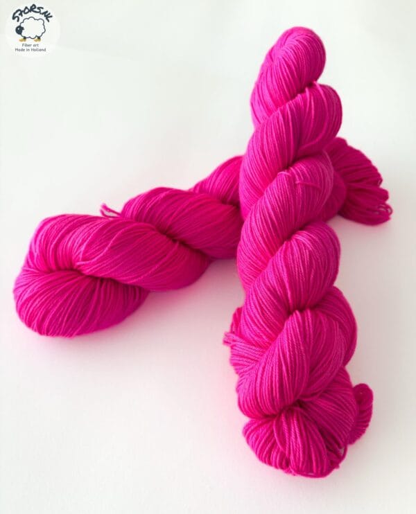 Semi solid superwash Merino yarn. ‘Neon pink’