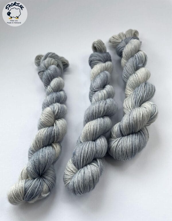 il_fullxfull.6816526804_qv1m.jpg Hand dyed superwash superfine Merino, Alpaca and mulberry silk fingering weight yarn. Ombre steel grey.
