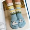 Knitting Moomin socks. 29 original designs.