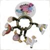 Five metal stitch markers with colorful enamel decorations.