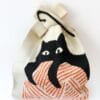 Japanese Knot Bag, with a Cat, on a Ball of Wool.